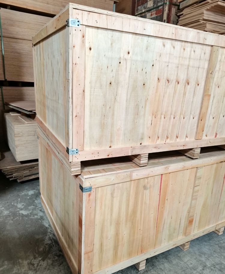 Large wooden shipping crates prepared for international delivery of wood components