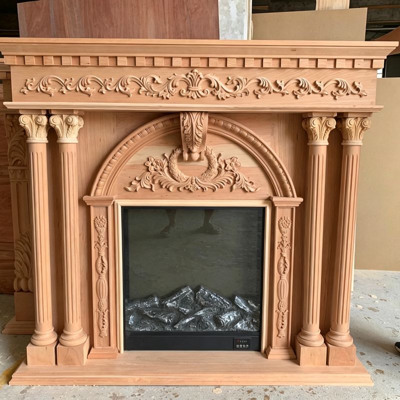Ornate wooden fireplace mantel with carved corbels and decorative columns
